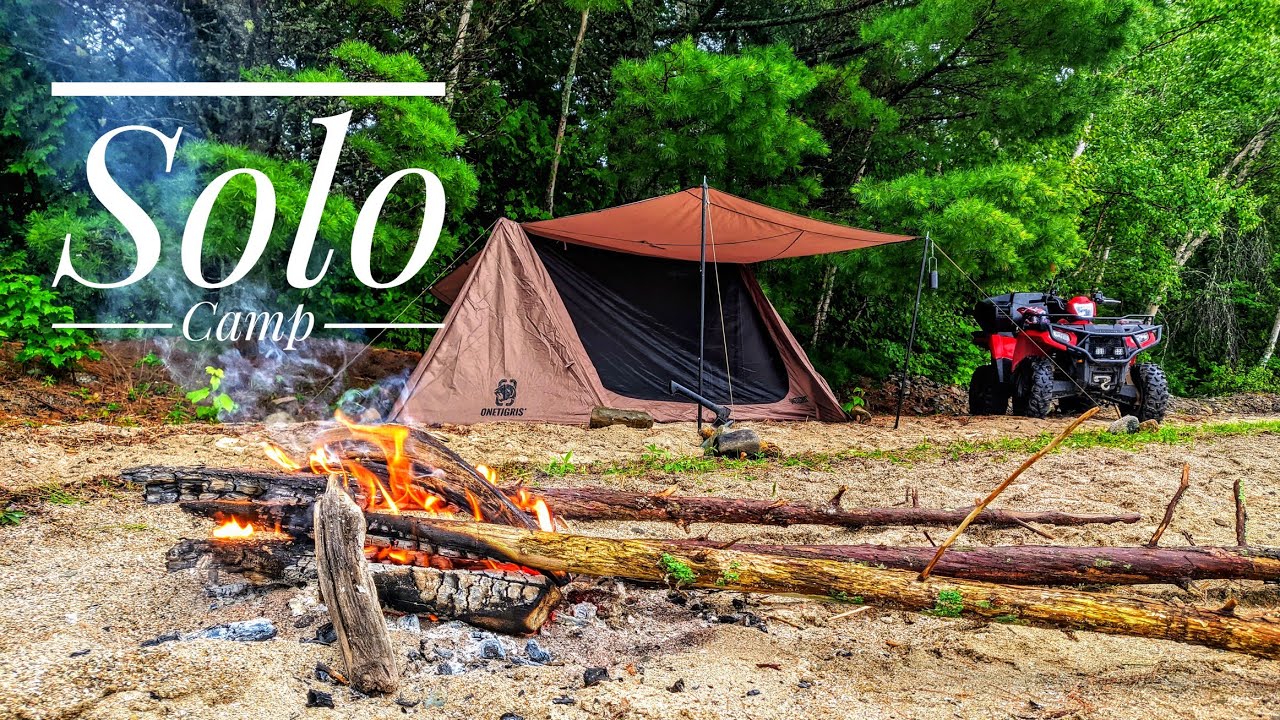 Solo Camping in a Rain Storm - Cooking Ribs over campfire, ATV Camping