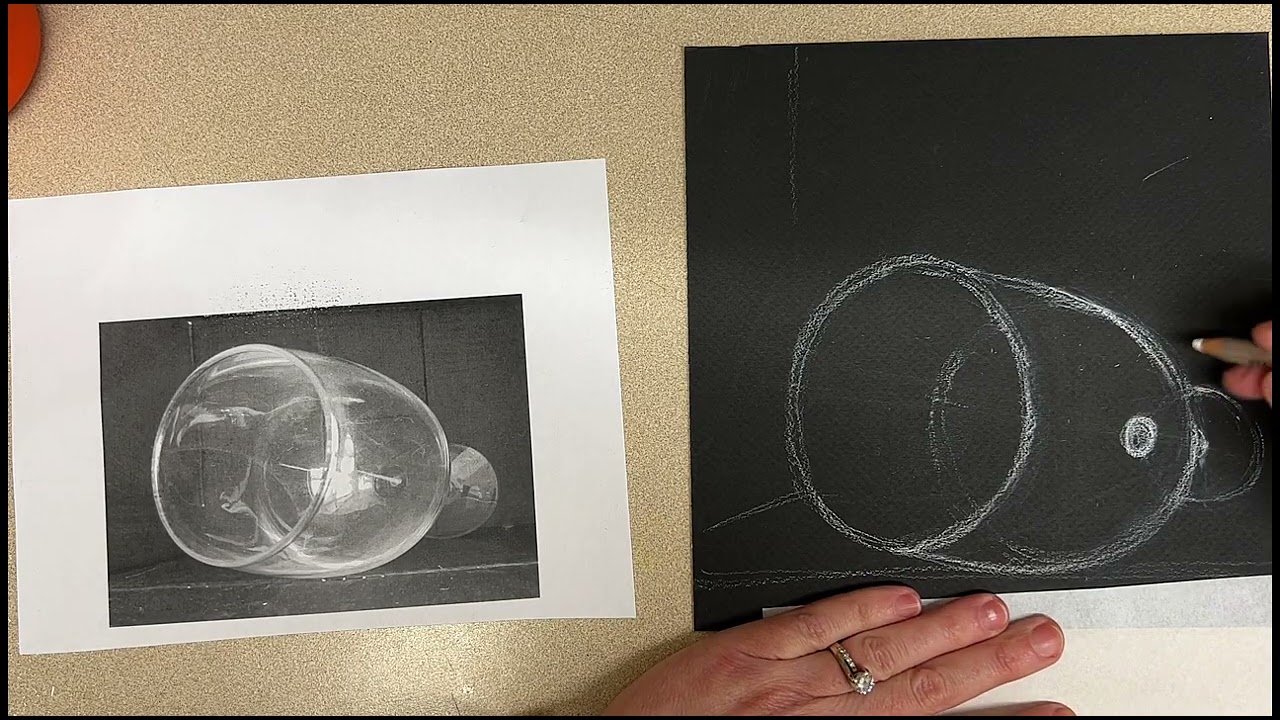 Glass drawing with white charcoal on black paper