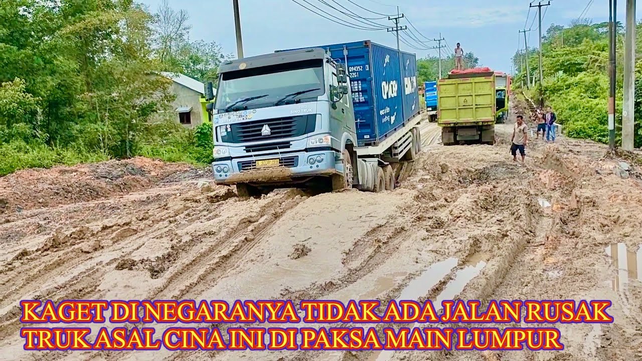 KAGET KARNA DI NEGARANYA TAK ADA JALAN LUMPUR ,TRUK ASAL CINA DIPAKSA HABIS HABISAN