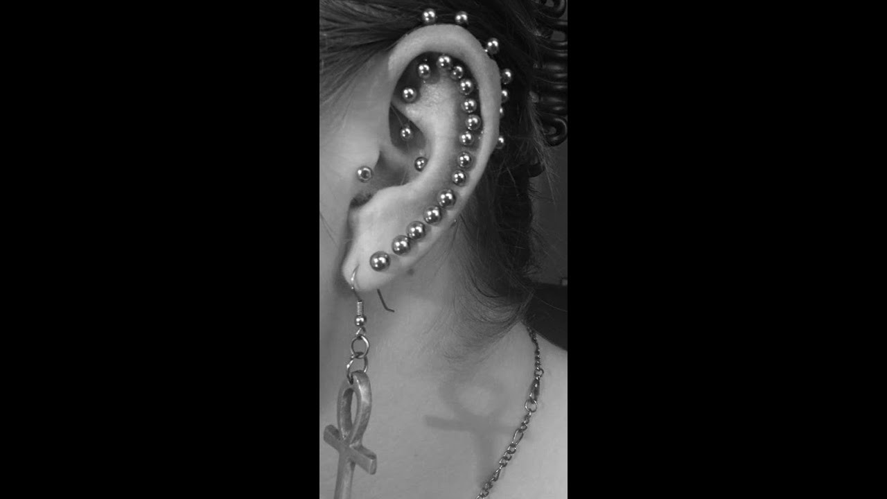 Getting my final two helix piercings