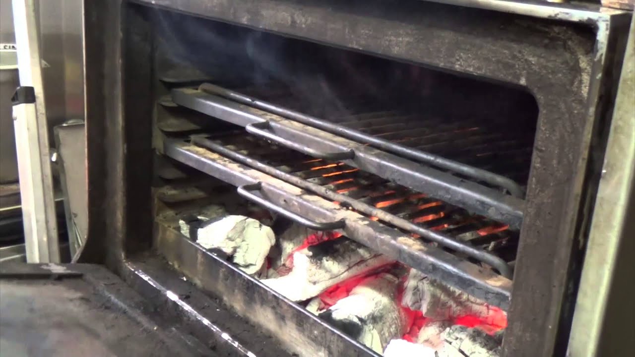 Cooking steak on the Josper at Blackwood's Bar & Grill at the Nira Caledonia