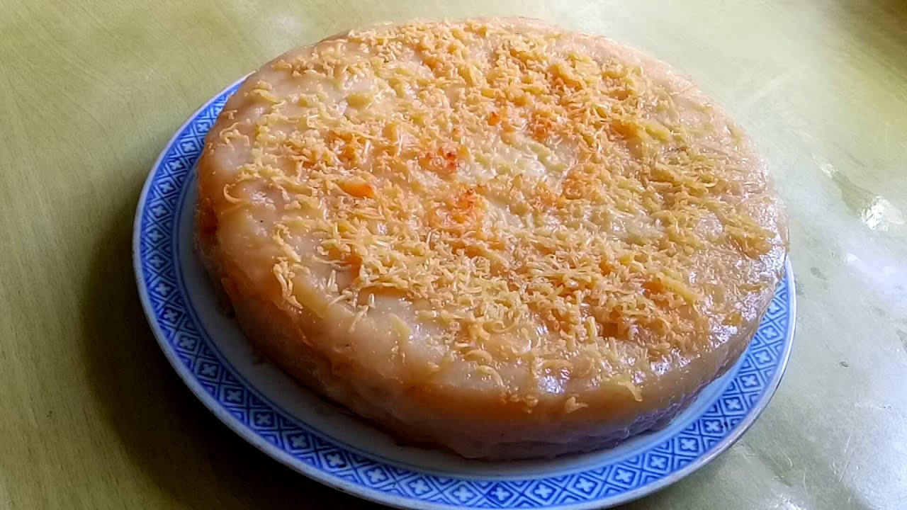 BIBINGKA WITH BUKO SA KAWALI /NO OVEN GLUTENOUS RICE CAKE WITH YOUNG COCONUT  by Melody Paguio