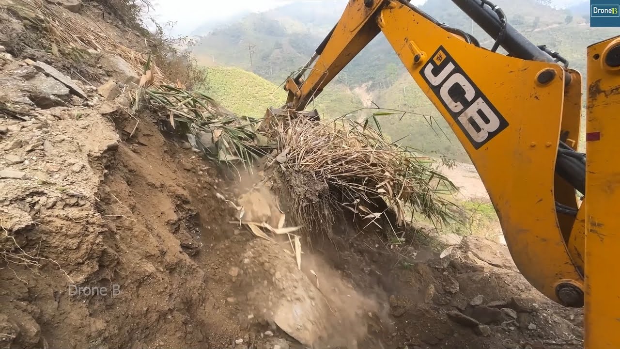 Backhoe on Rocky Hill Trying to do an IMPOSSIBLE Mountain Road Building Work