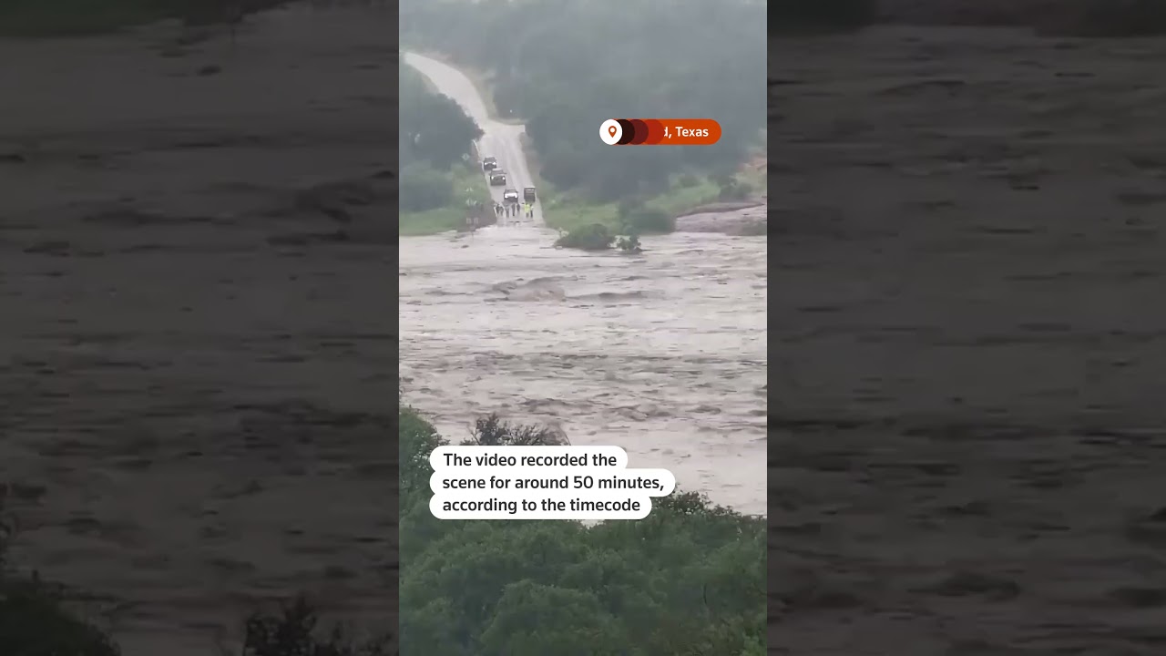 Texas floodwaters rise over causeway