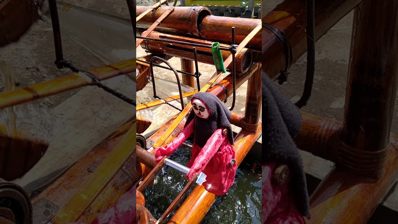 kincir air dari bambu cari lagu sendiri