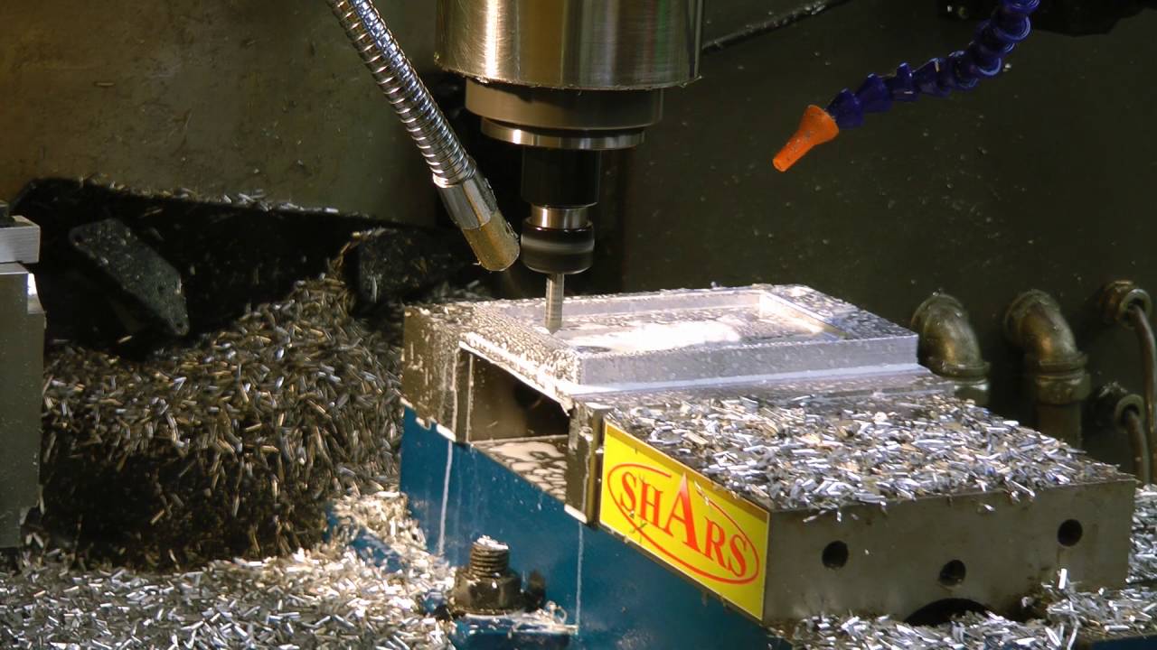 Complete machining of camera case back - includes high-speed shots