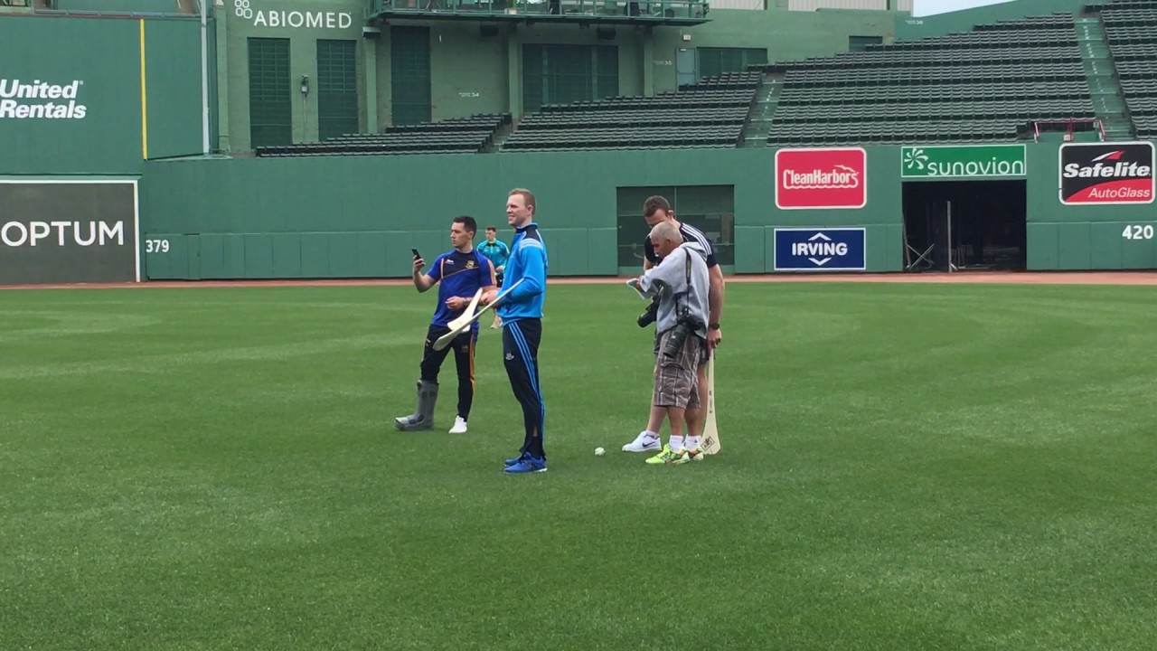 Red Sox pitcher Carson Smith warms up during Hurling demonstration at Fenway