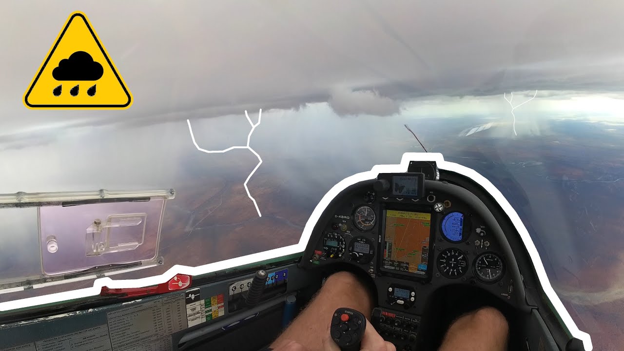 Glider playing around rainshowers in Namibia