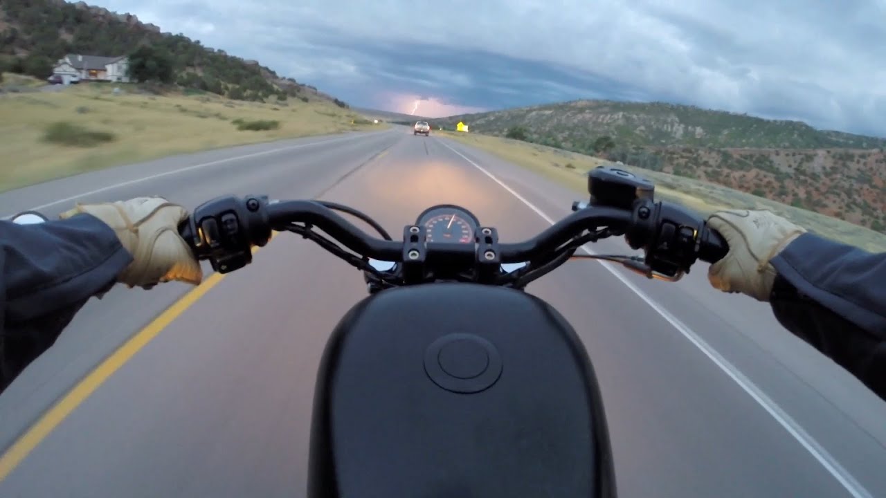 Riding Into the Storm on My Iron 883 - Right Thing Motos