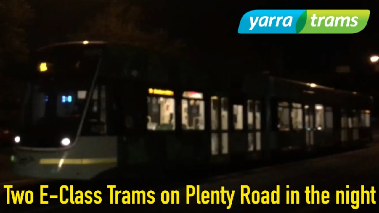 Two E-Class Trams on Plenty Road in the night