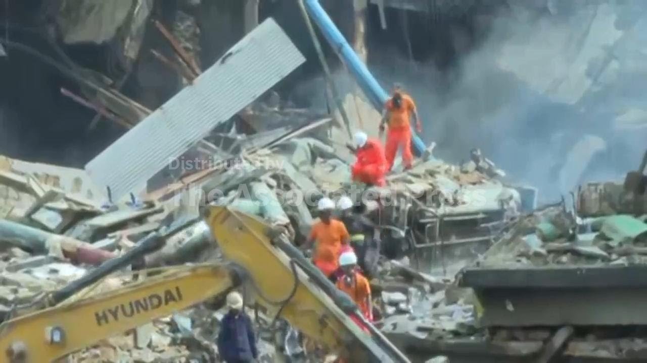 Death toll in Karachi shopping plaza fire rises to 11 as search continues for about 60 missing
