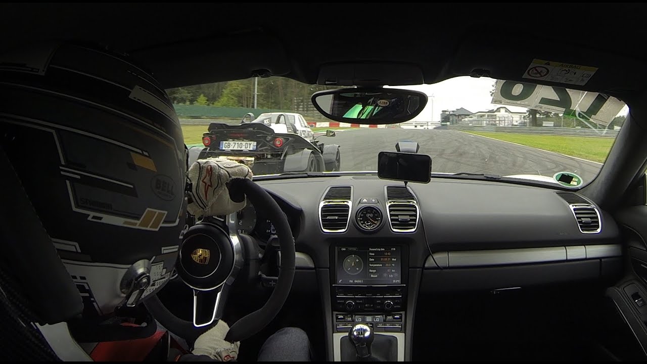 Porsche GT4 chasing KTM X-Bow around Circuit Zolder