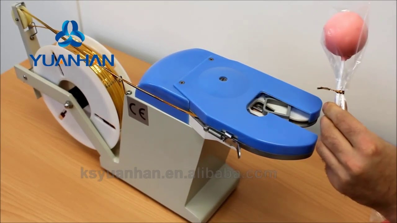 Automatic lollipop twist tie machine