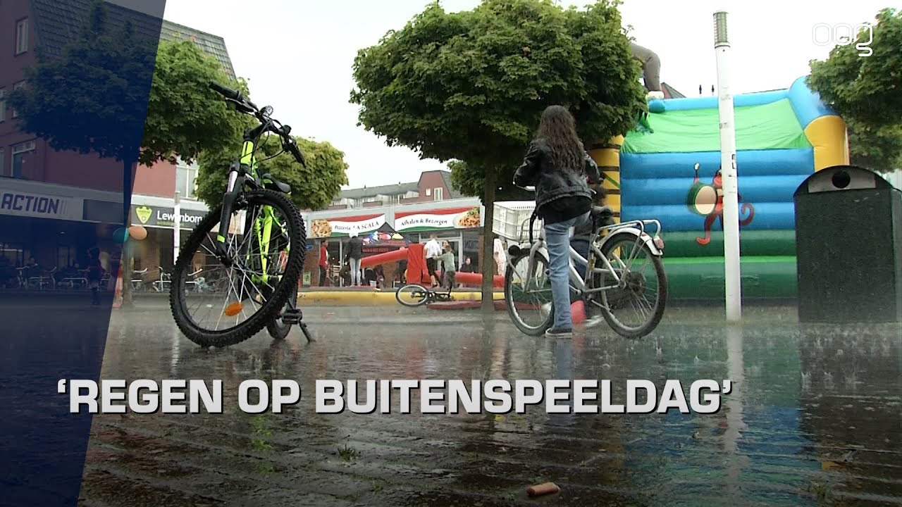 Regen kan fanatieke kinderen niet tegen houden op Buitenspeeldag in Lewenborg