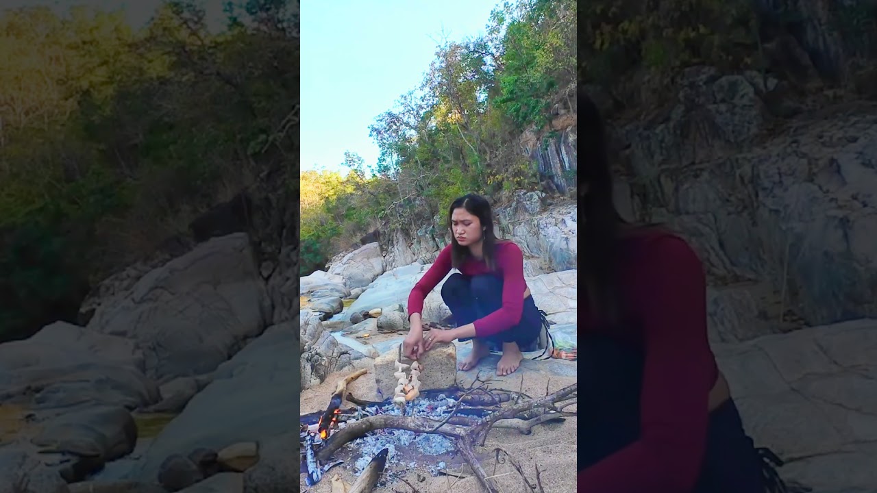 A beautiful girl grilling meat alone on a deserted island 