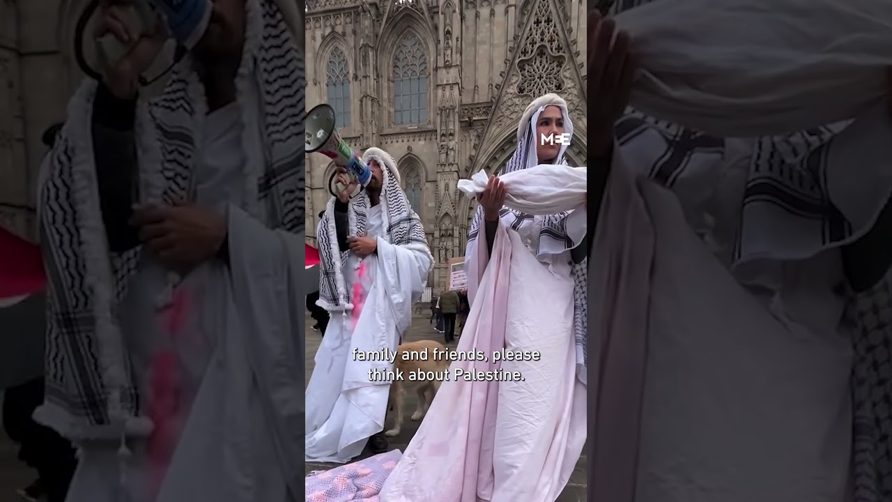 Pro-Palestine protesters carry baby Jesus outside UK parliament on Christmas Day