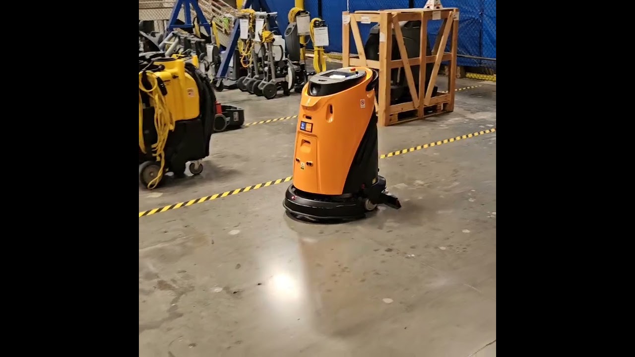Taski ecobot 50 cleaning warehouse floor
