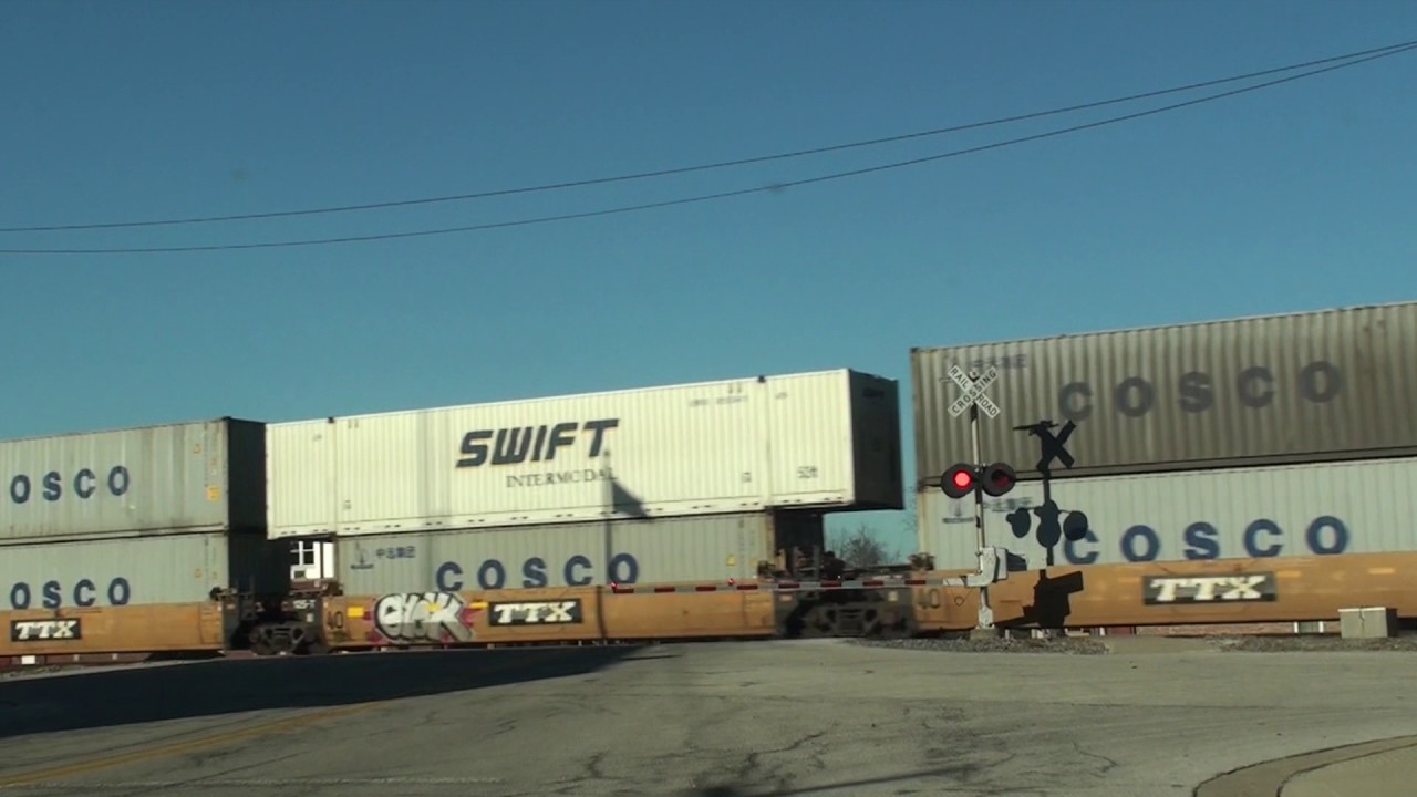 U.S. Flag Shadow on Shipping Containers on a Train