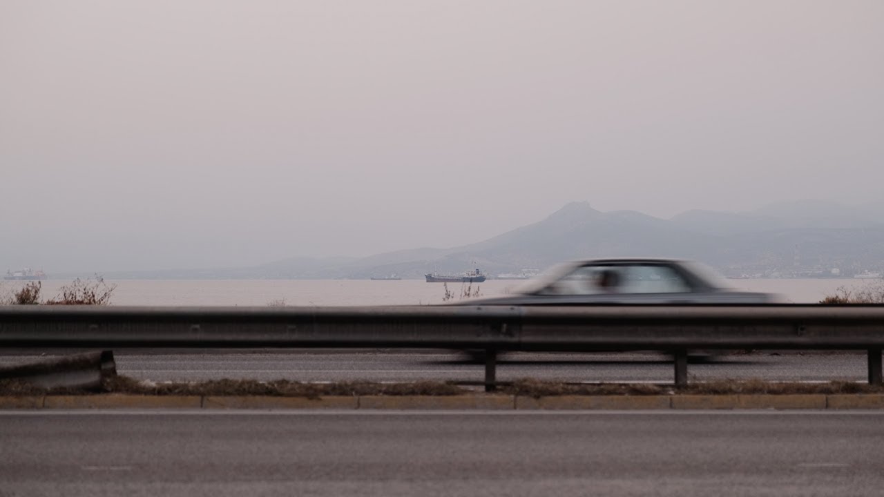 You pull over and look at the passing cars