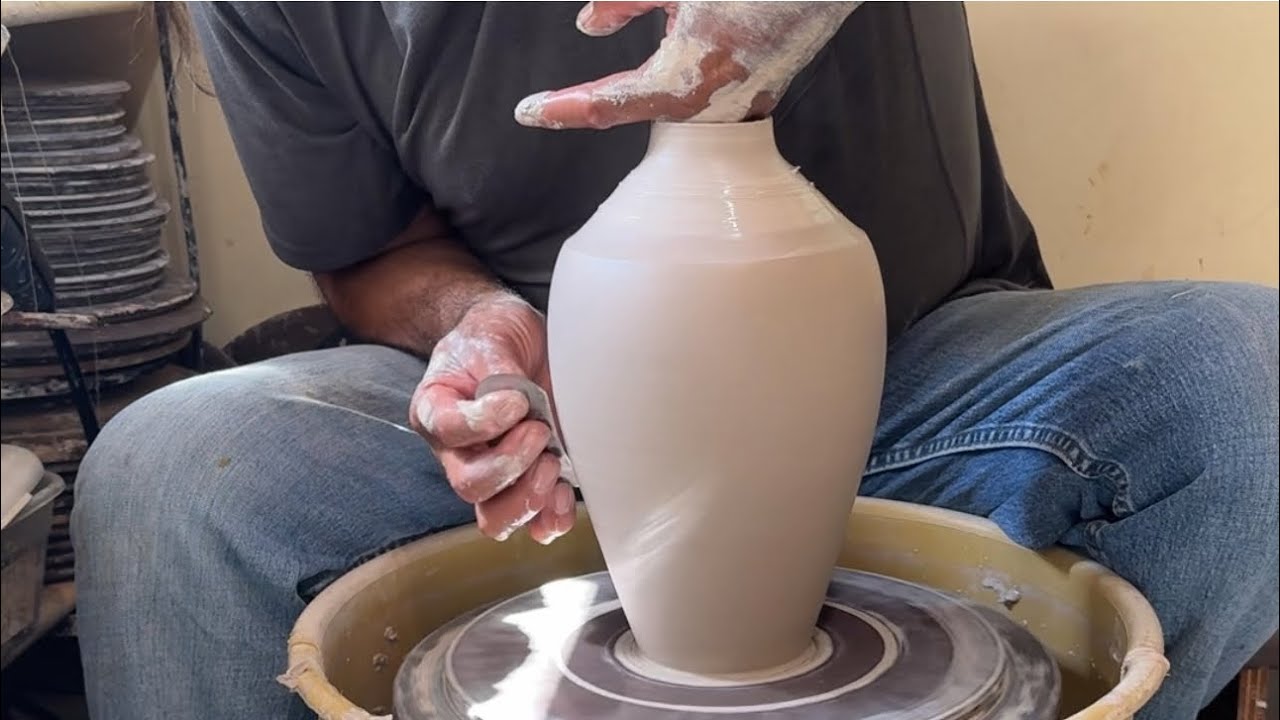 Throwing at 4.5 pound vessel on the potters wheel