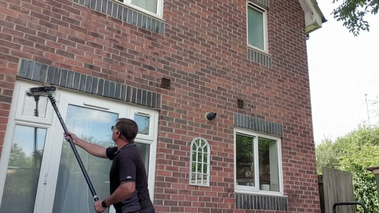 Water fed pole window cleaning using a trolley and backpack.
