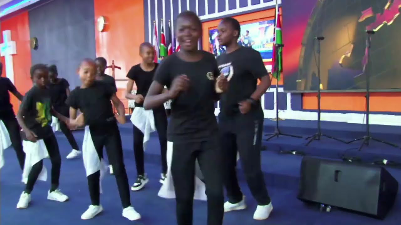 JCM dancers wish  Bishop Ben happy birthday by singing like this 