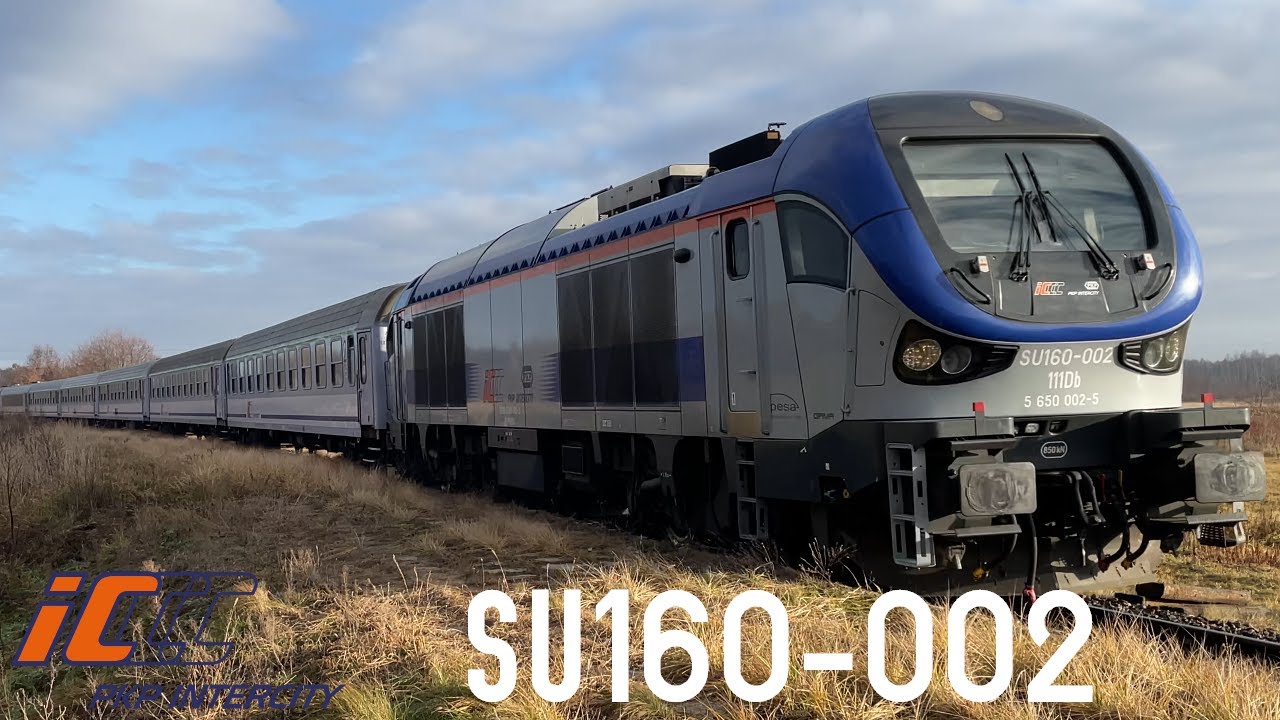 [PKPIC] SU160-002 z konkretnym 8 wagonowym HETMAN-em mija nieczynny p.o. Dąbrowica Małopolska [4K]