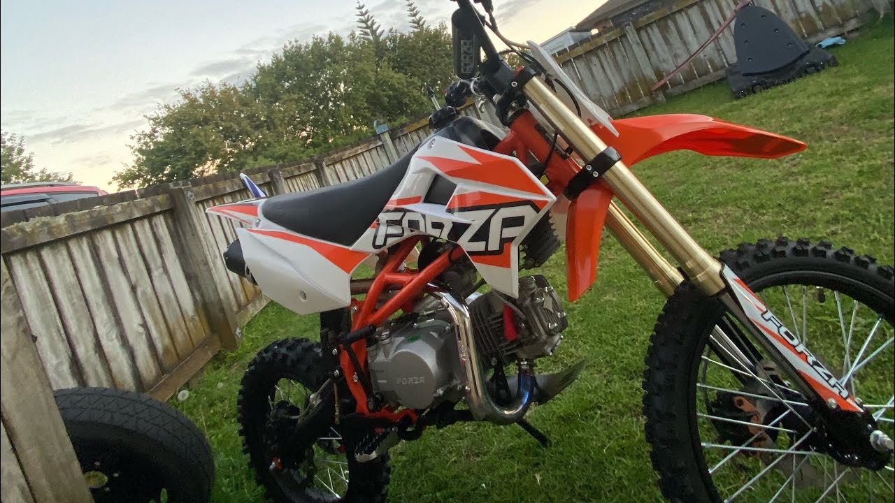 12 year old rides a 140cc dirt bike.