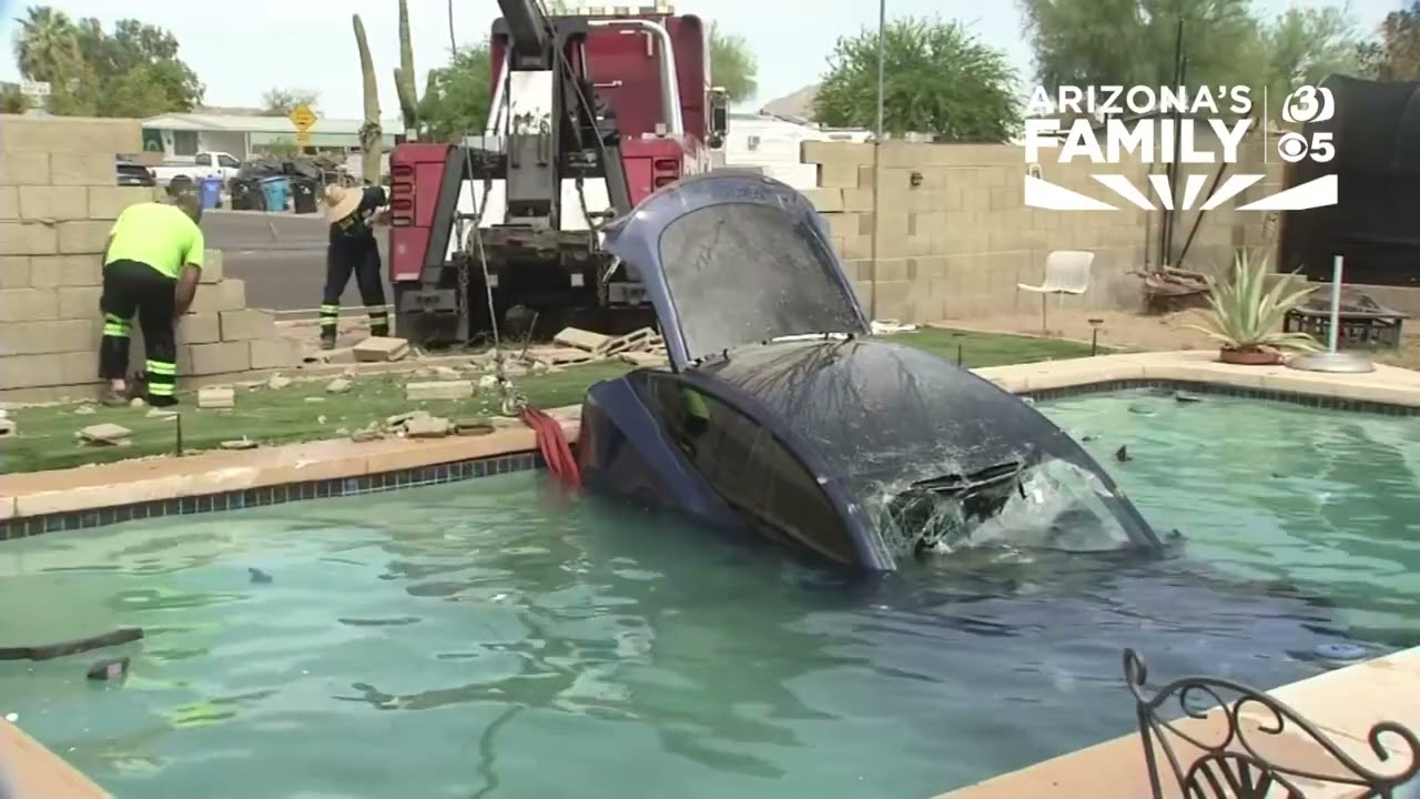 Tesla car lands in Phoenix homeowners pool