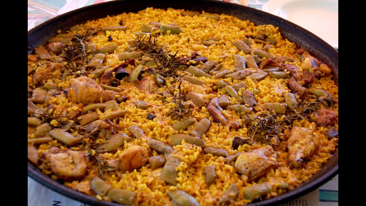 Cómo cocinar una  paella valenciana, a leña, al estilo de Mariaje