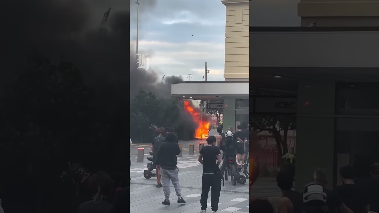 Car catches fire in downtown Auckland near busy train station