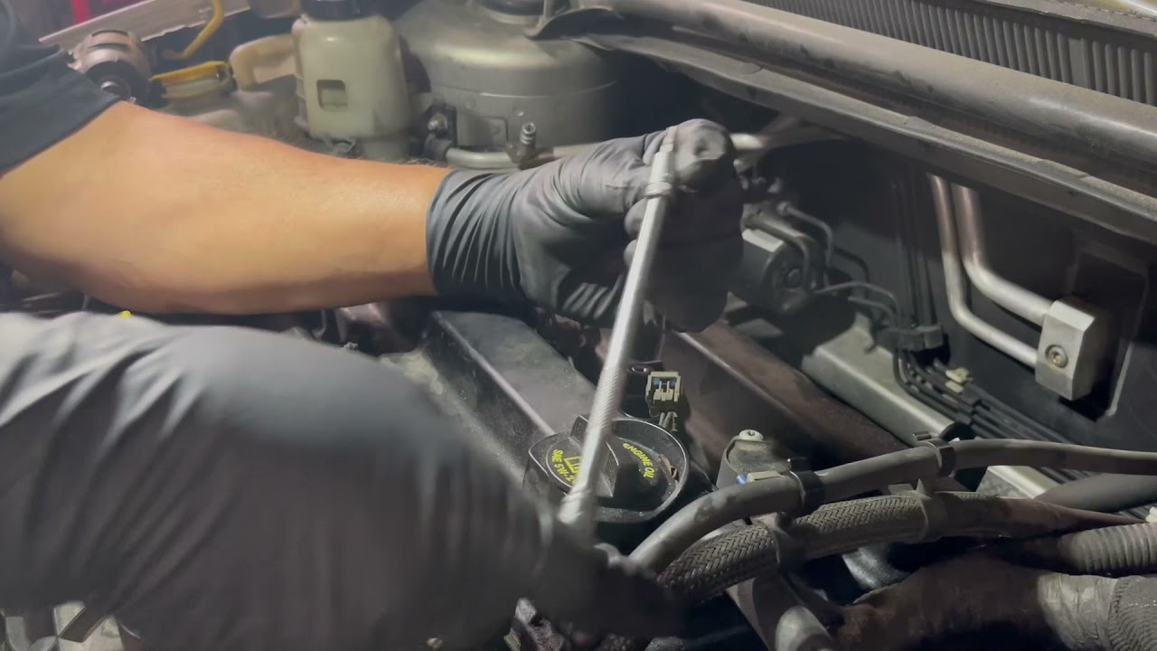 Como cambiar junta tapa de punterias de un Chrysler 200  2011