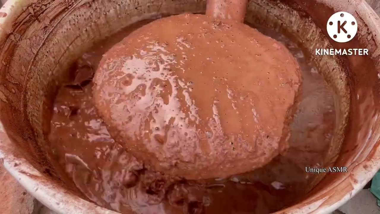 Gritty Red Dirt Crumbling in Water