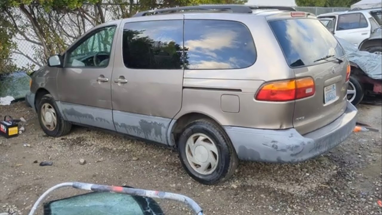 1999 Toyota Sienna door panel and side mirror removal and replacement 