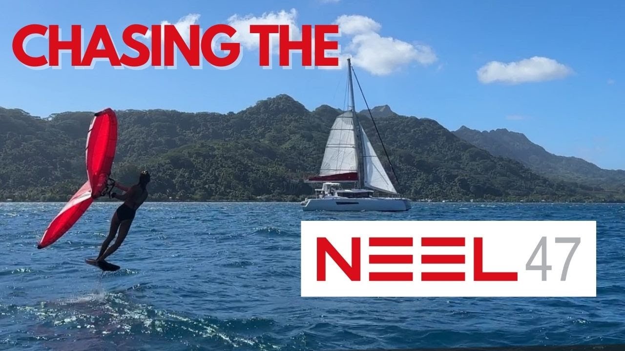 Wingfoiler chasing the NEEL 47 trimaran in French Polynesia
