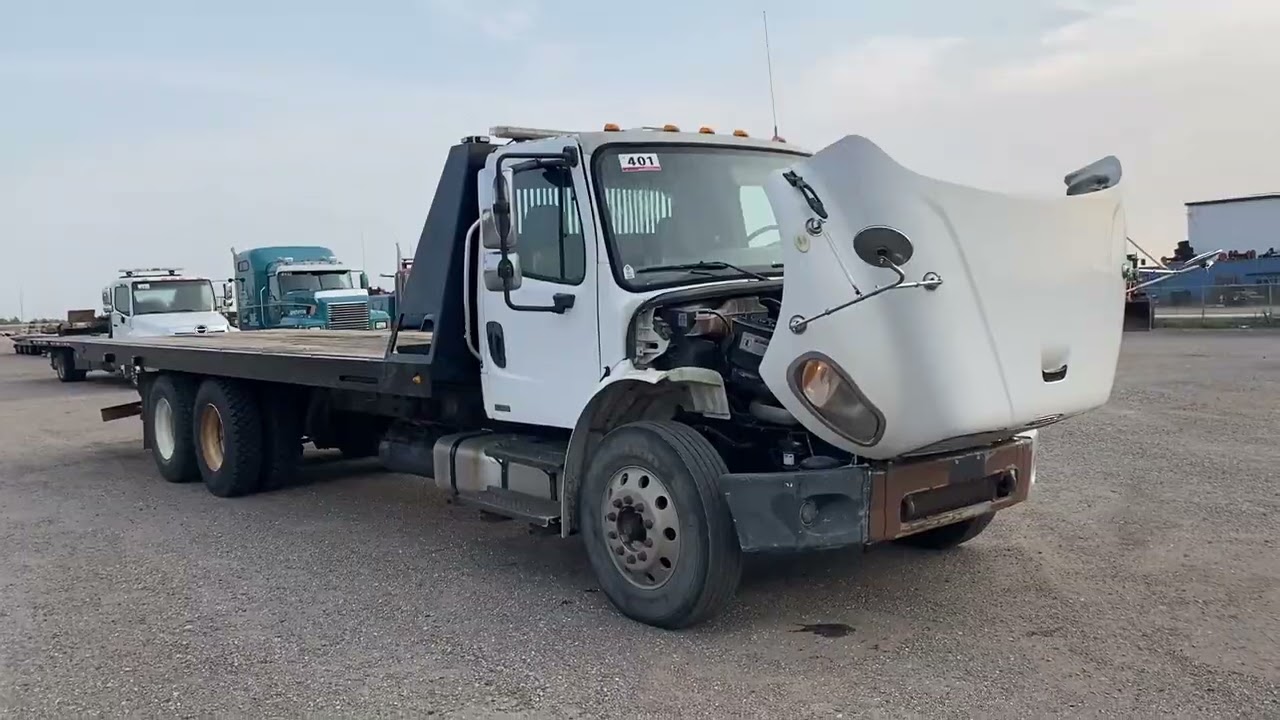 2006 Freightliner T/A Rollback Tow Truck