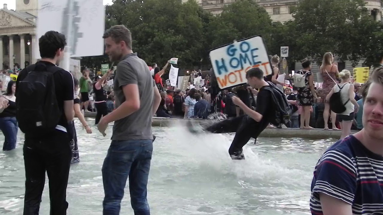 feeling hot hot hot people dancing in Trafalgar Square fountain by jim connor