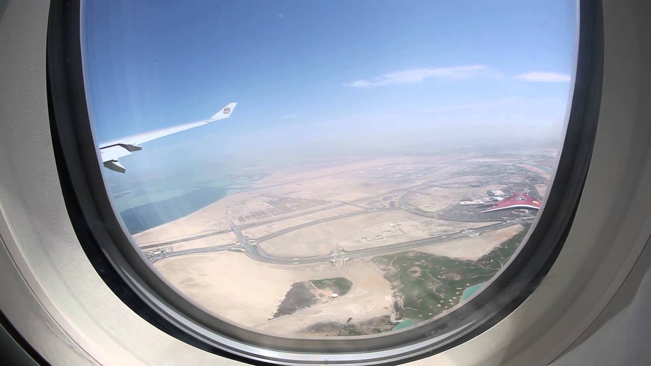 View from plane window Abu Dhabi airport and Ferrari World Abu Dhabi Theme Park