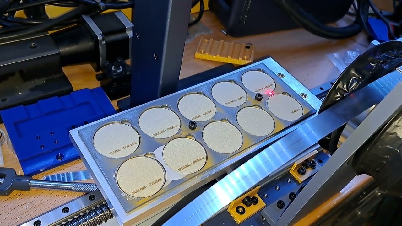 Lasering multiple coins in one batch.