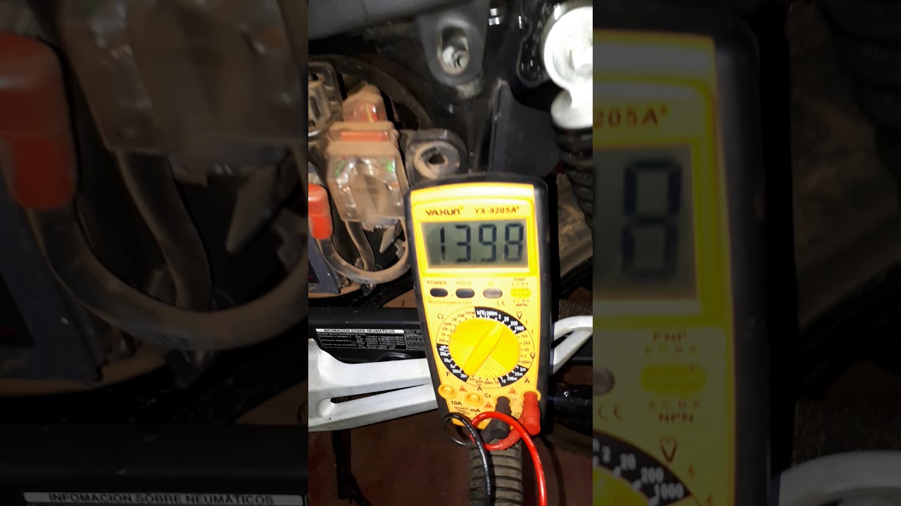 Carga normal honda  titan 150 asi se mide la carga de bateria, 100%