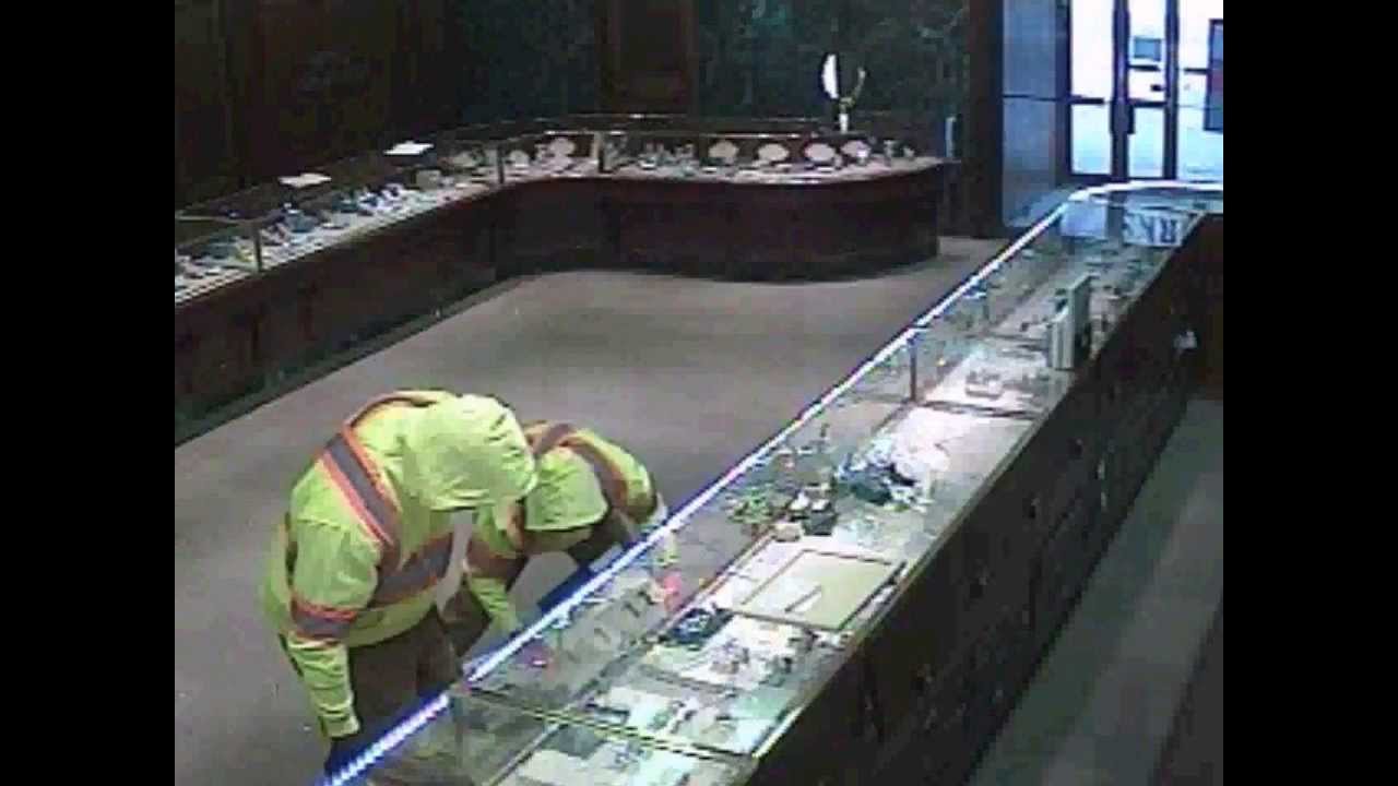 Armed Robbery Investigation -- Surveillance Footage