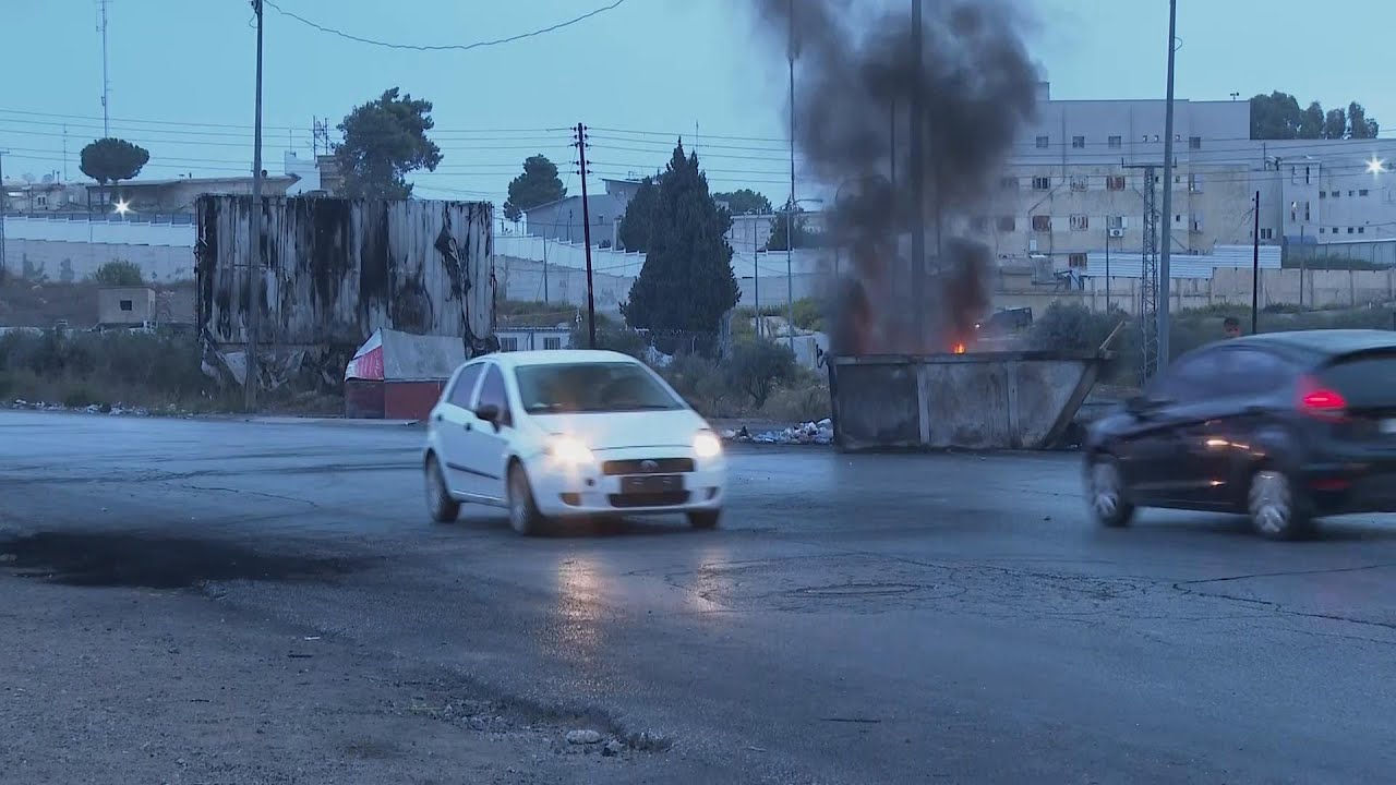 Young Palestinians throw stones at Israeli soldiers in Beit-El at northern entrance to Ramallah