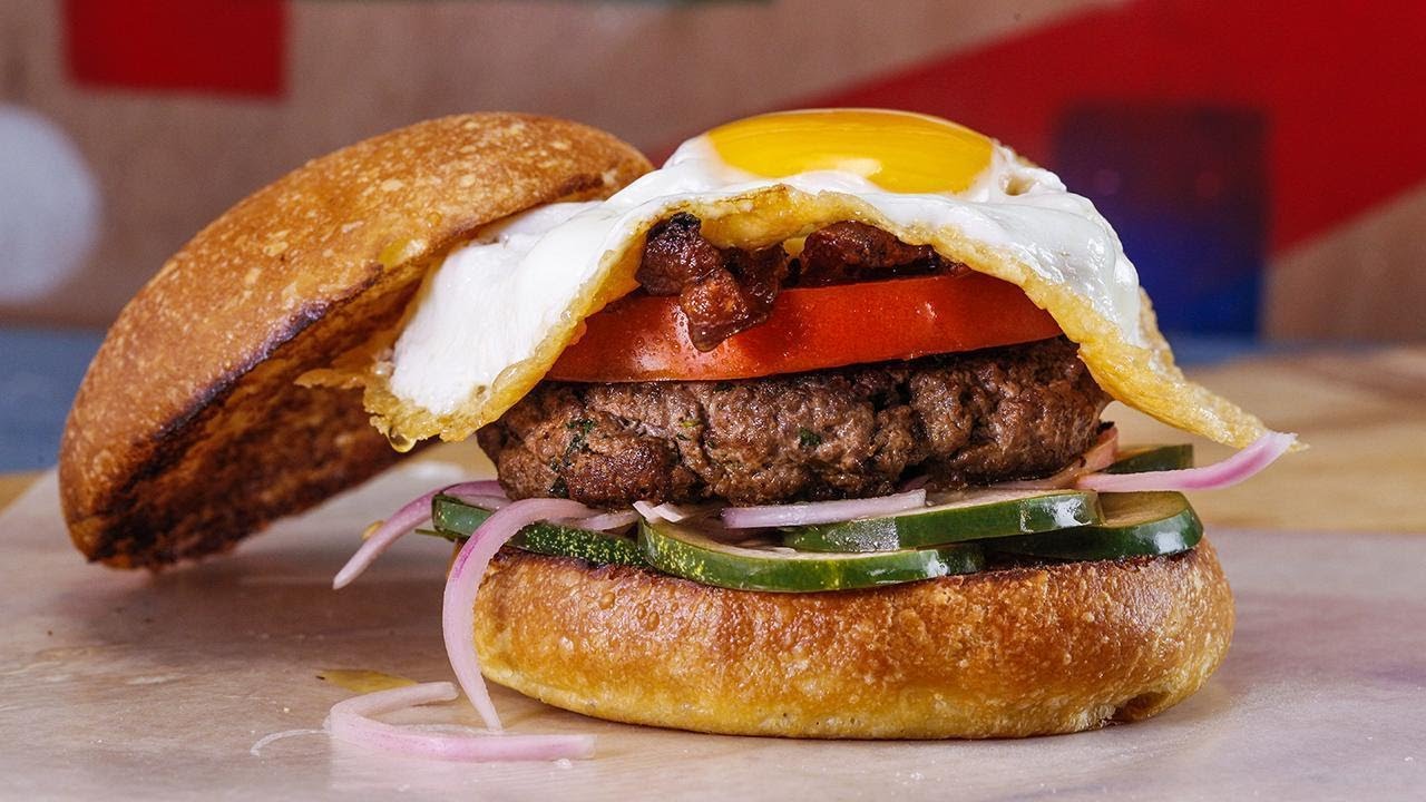 Rachael's Garlicky Burgers with Bacon, Beefsteak Tomato and Parm Frico Eggs and Quick Pickles