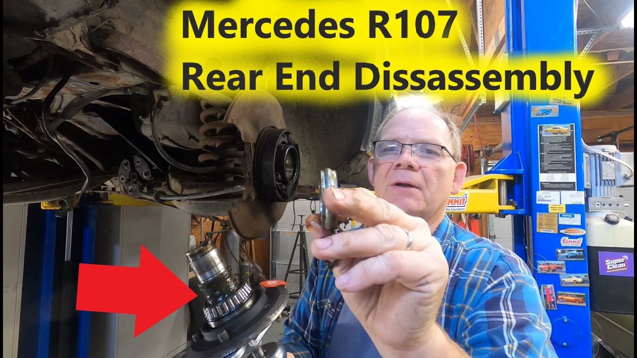 Mercedes R107 1973 года выпуска - Снятие ШРУСов, подшипников задних колес и дифференциала.