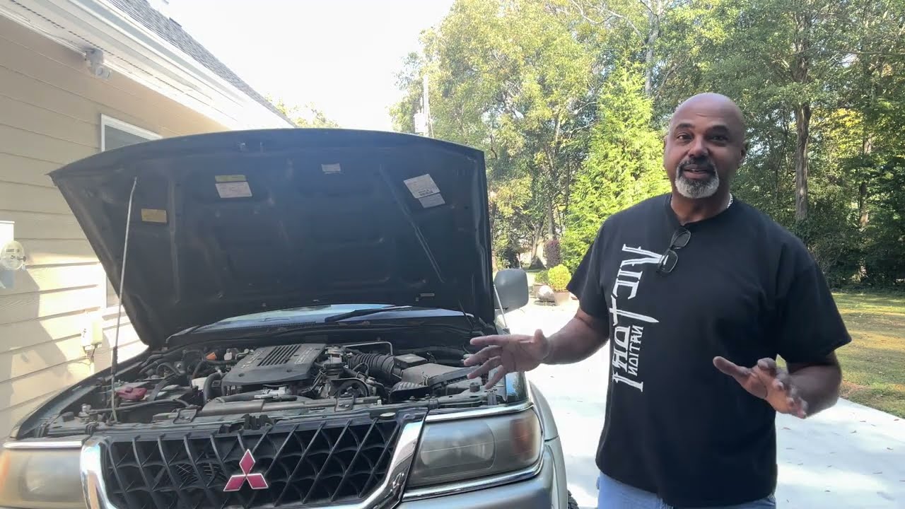 How to remove an alternator from a 2000 Mitsubishi Montero Sport