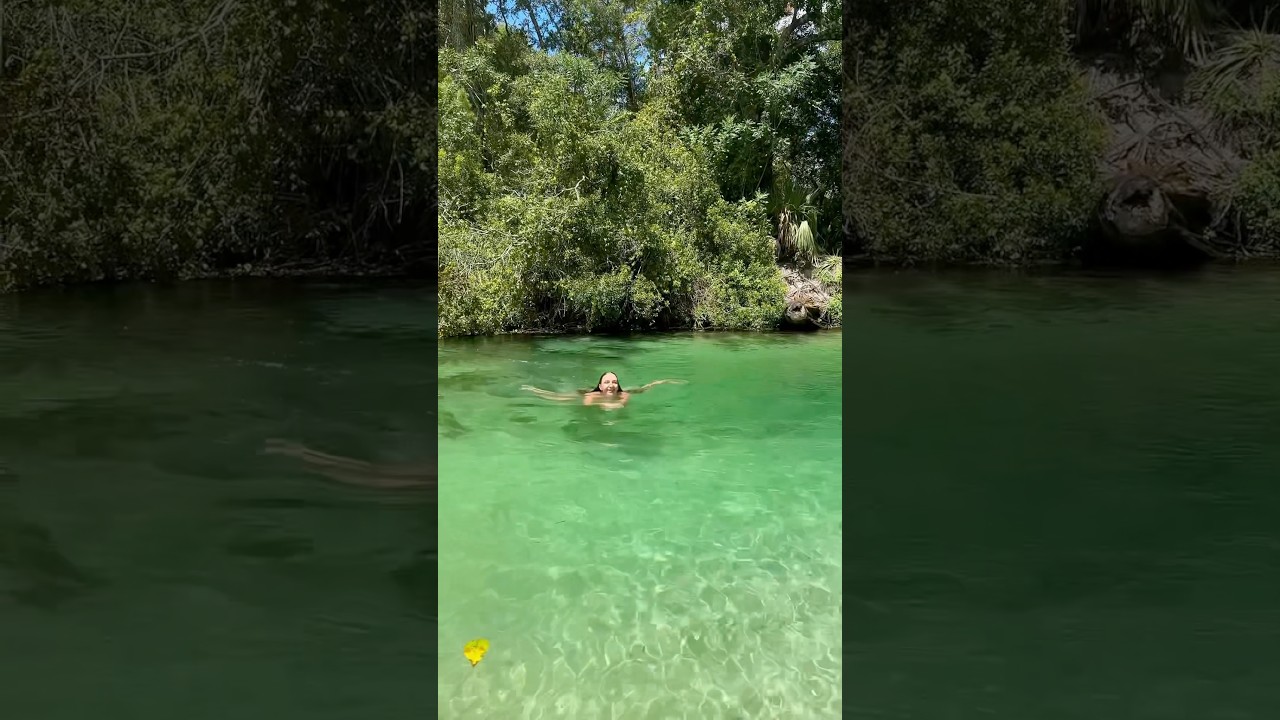 Swimming women in the ice river 