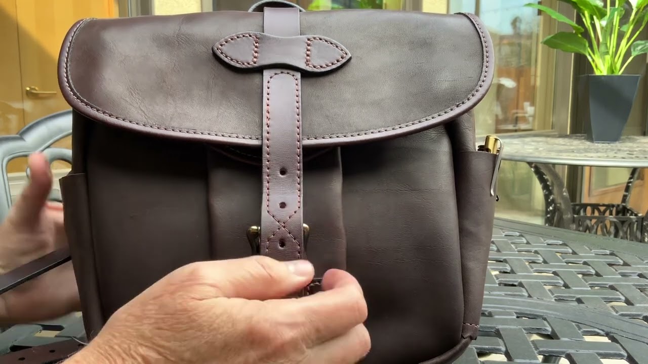 The Filson Workshop Weatherproof Leather Field Bag.