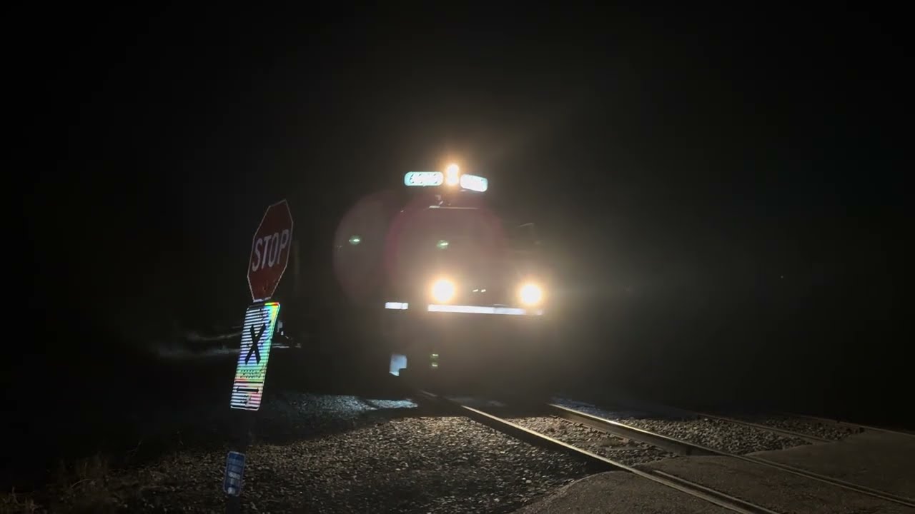 5 locomotive ￼KN380 passing Albany with some rock hoppers!