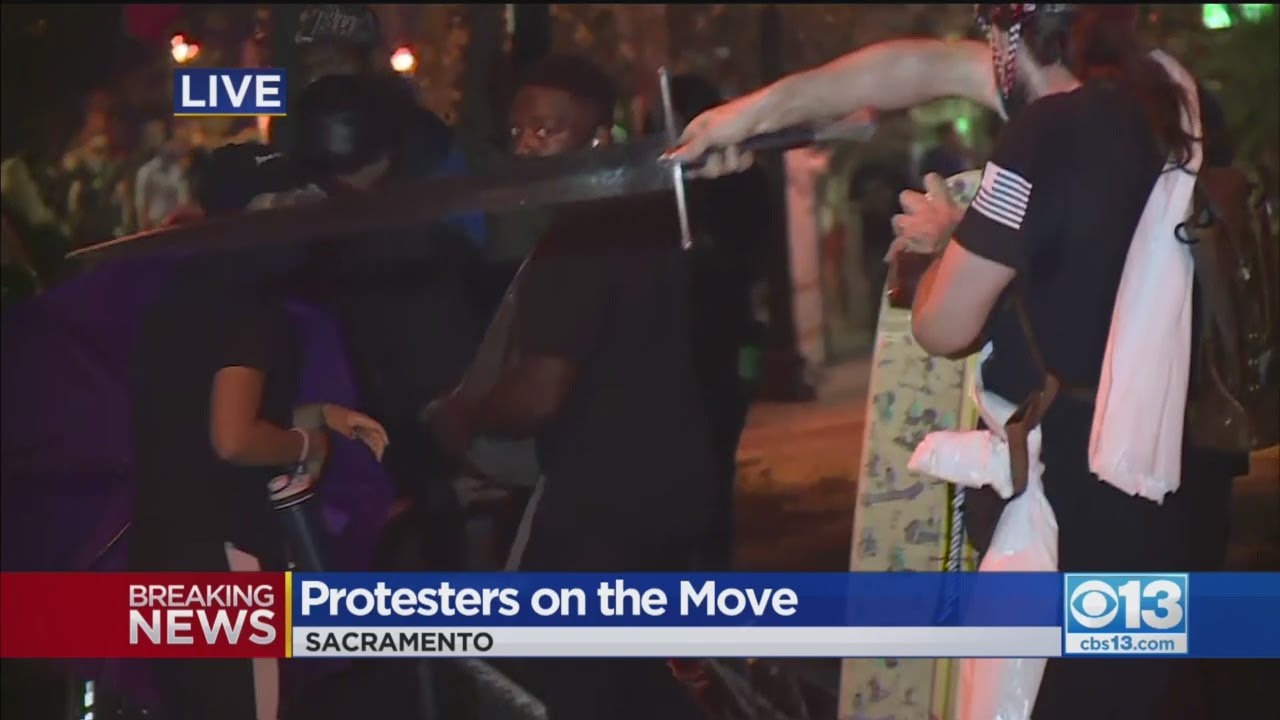 Man Waves Sword At Crowd During Downtown Sacramento March