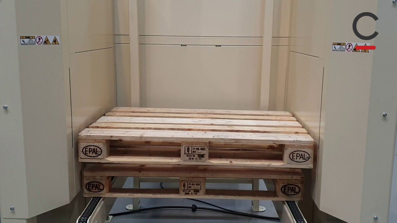 Dispensador automatico con transportador de cadena para palets
